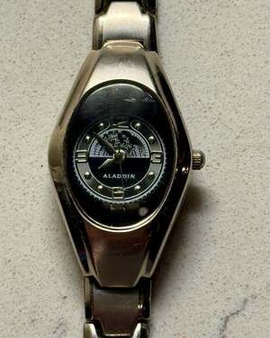 Aladdin Ladies Silver Tone Stainless Steel Analog Quartz Wristwatch